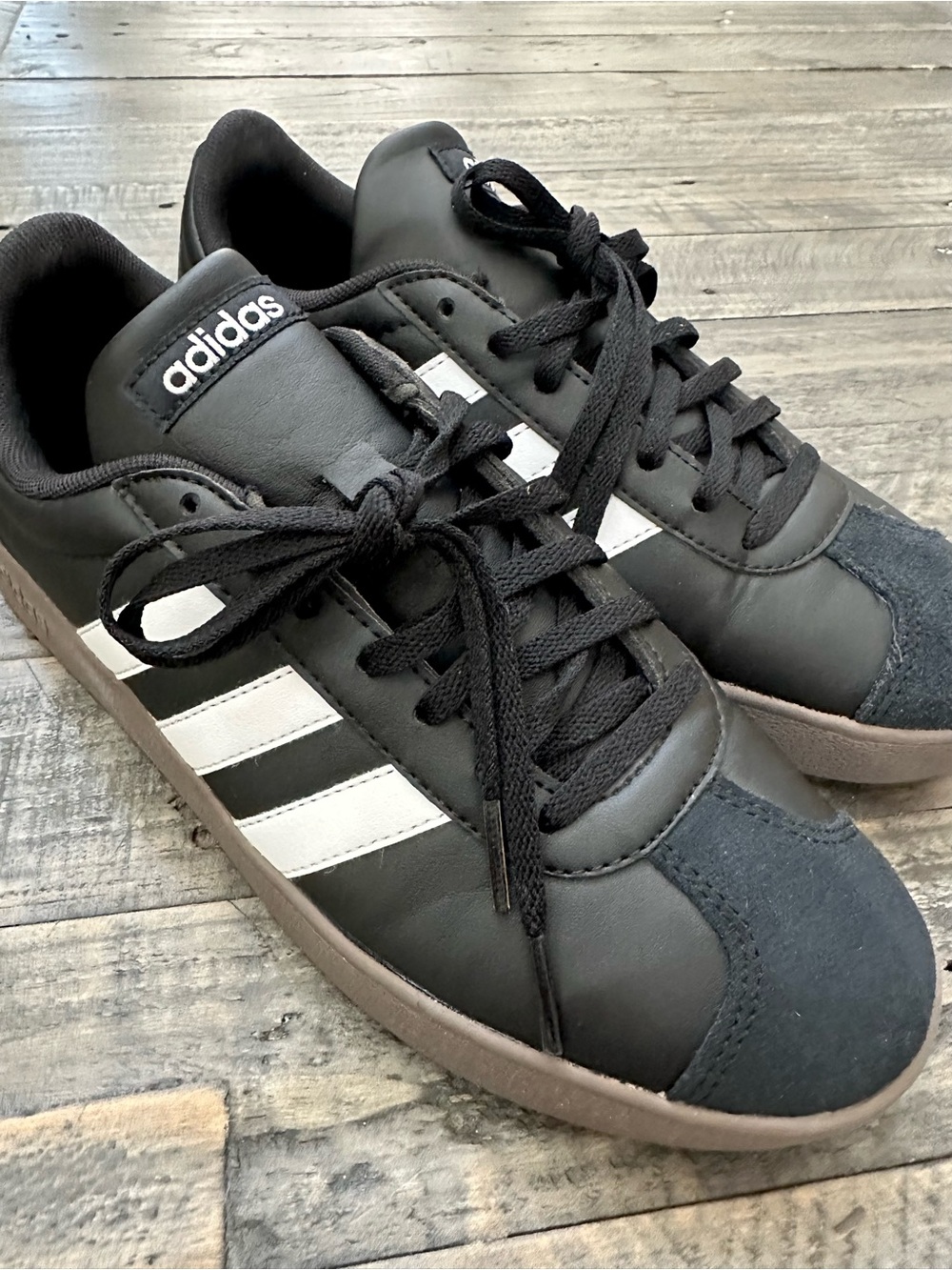 Adidas Black Sneakers with White Stripes and Tan Sole